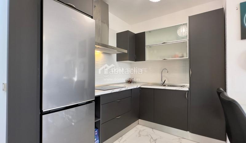 Foto d81ef1fc-9adb-4787-bf47-bb48cf94af04. Piso dom tenerife inmobiliaria se complace en presentarle en exclusiva este magnífico piso de 1 dormitorio con impresionantes vistas al en Adeje Foto d81ef1fc-9adb-4787-bf47-bb48cf94af04. Piso dom tenerife inmobiliaria se complace en presentarle en exclusiva este magnífico piso de 1 dormitorio con impresionantes vistas al en Adeje