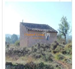 Masia a Monòver. Venta de parcela rústica con casita de piedra Masia a Monòver. Venta de parcela rústica con casita de piedra