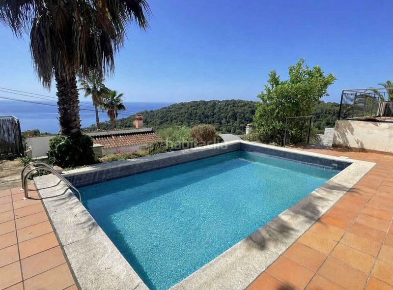 Foto 738fb39b-066b-4c96-8903-fe482b2c4b7d. Xalet amb xemeneia aparcament piscina a Santa Cristina-Sant Francesc Blanes
