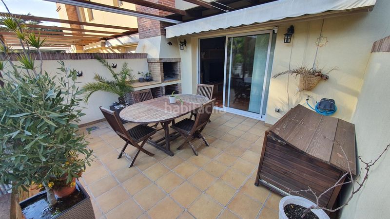 Foto b05ac1be-9be1-472a-ad20-369dda673412. Casa adossada amb aparcament a Canet de Mar