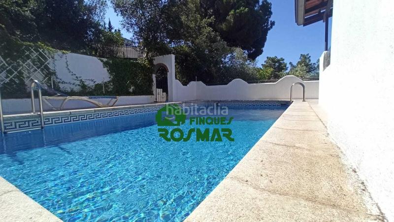 Foto 0c48d9d2-97c8-4903-bc77-ad449fa585e1. Casa amb calefacció aparcament piscina a Canyelles Lloret de Mar