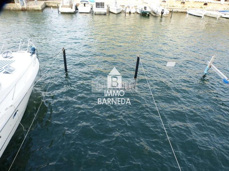Foto 1b7a0f29-6391-49e3-a7e0-c59e05fd183d. Chalet casa de pescador con garage y amarre para velero 11.5x5 en Empuriabrava