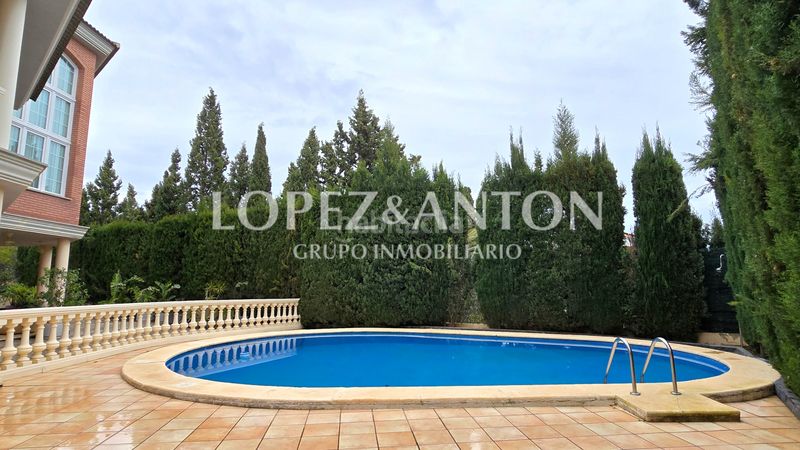 Foto d7b2ad88-3199-4d0e-a8c4-6bf5db2b1b70. Chalet with fireplace parking pool in Benaguasil