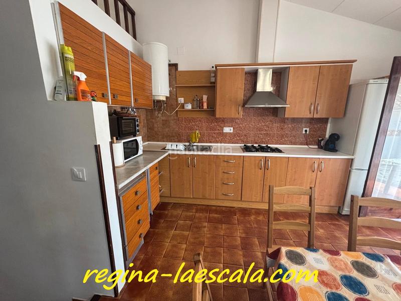 Foto c343fd36-615c-49a2-a11d-6c07f0fa2437. Chalet casa independiente de planta baja con piscina privada en Escala (L´)