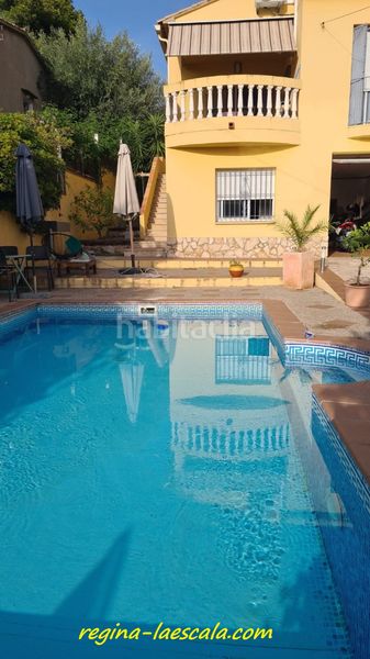Foto a8f9fabd-5f0a-46d3-842a-508e7d51a054. Xalet amb calefacció aparcament piscina a Riells Escala (L´)