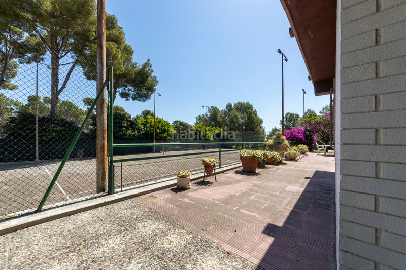 Foto d75296f2-5581-4a5e-9d93-dc43497399ec. Casa adossada amb xemeneia piscina a pla de maset - cap de Salou Salou
