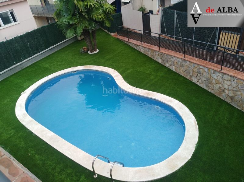Foto 8408e9a0-672a-4607-84db-7f6a5442f04a. Casa adossada amb xemeneia calefacció aparcament piscina a Sant Andreu de la Barca