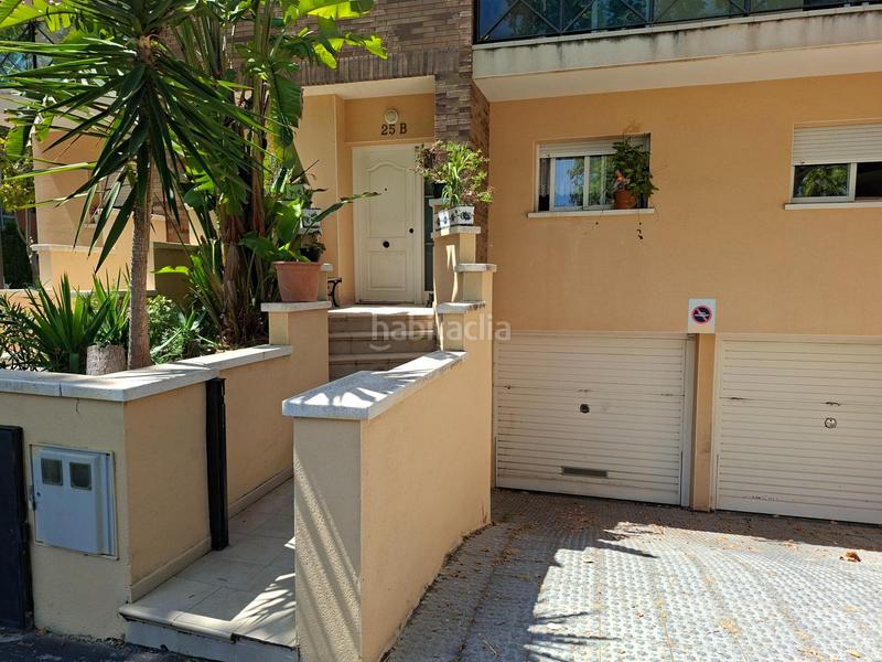 Foto 1114f847-ea59-4ae9-8d7a-98313d8d2712. Casa adosada  con piscina comunitaria en la mejor zona en Calafell