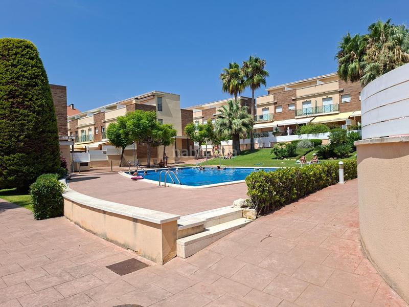 Foto 161332e2-62fc-4bc6-9fae-85179c25a5fb. Casa adosada  con piscina comunitaria en la mejor zona en Calafell
