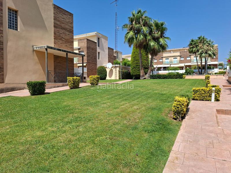 Foto 16316470-5efb-4b9f-8653-fa6391600a16. Casa adosada  con piscina comunitaria en la mejor zona en Calafell