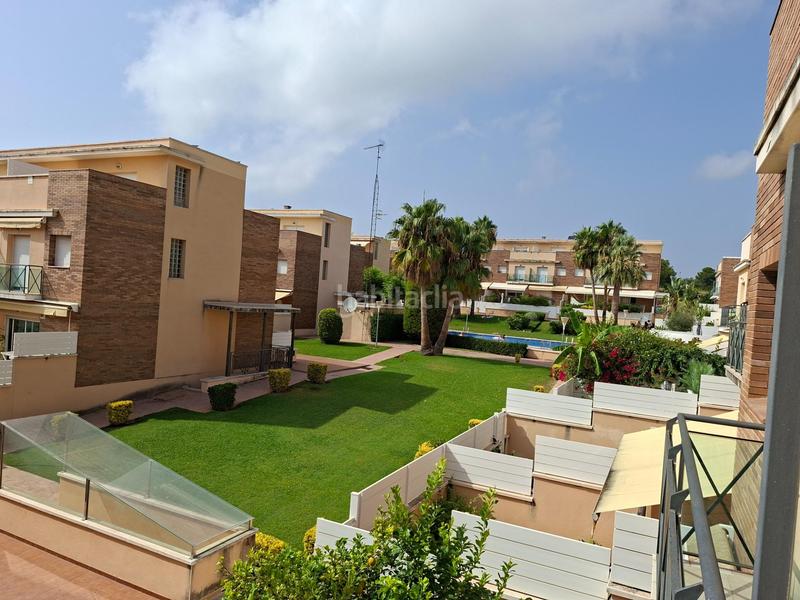 Foto 359b9fa7-bef8-4942-8019-f4021c9ef25b. Casa adosada  con piscina comunitaria en la mejor zona en Calafell