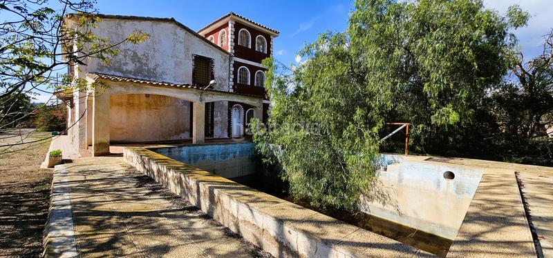 Foto 6118fba2-389e-40ad-ad26-06c953198fb9. Chalet avec cheminée piscine dans Totana