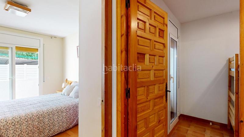 Foto be0e15cd-4921-4732-a937-d5e2ee0fae2b. Planta baja con jardín y parking en El francas Coma-ruga