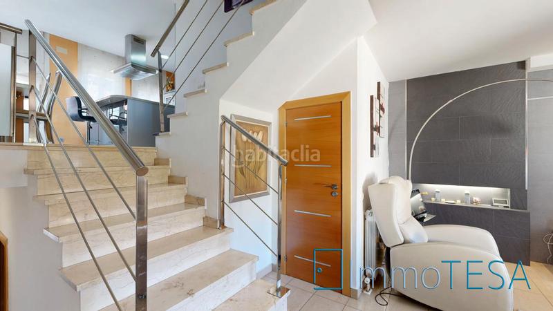 Foto 241a36f2-5b32-4ea9-ae48-0630a592ef86. Casa adossada amb calefacció aparcament piscina a Barberà del Vallès