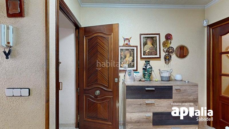 Foto 0cf78323-cb62-477a-a6fb-672811eccd9a. Casa adossada amb calefacció aparcament a Creu de Barberà Sabadell