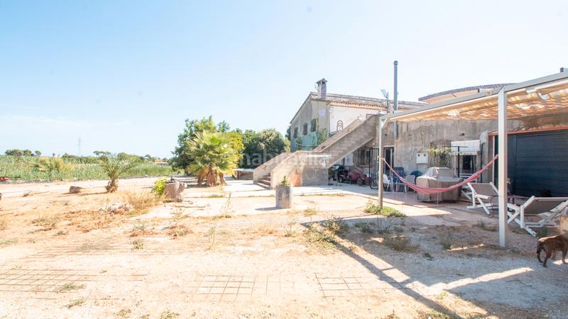 Foto 8768cbfe-c7ba-4cbe-b50c-d4c3025a4b39. Masia amb calefacció aparcament piscina a Ondara