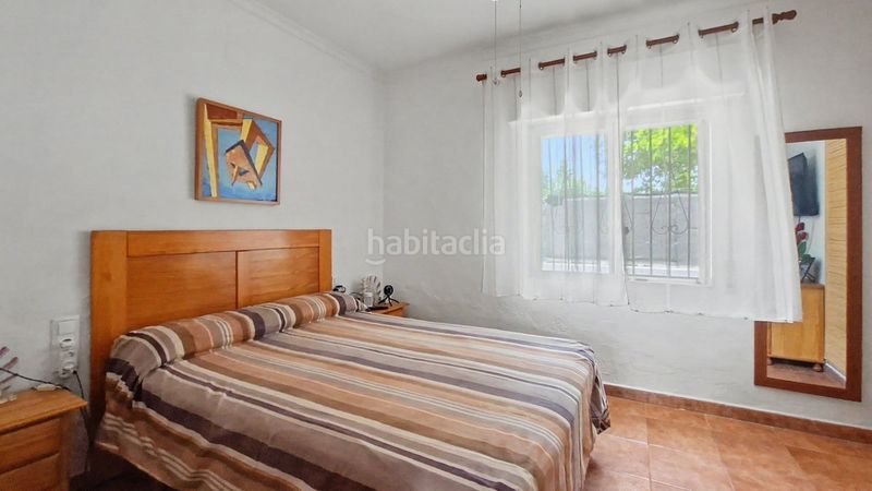 Foto f83a6663-062f-4a90-b69c-93f8ce70d32e. Casa amb calefacció aparcament a Oliva playa Oliva