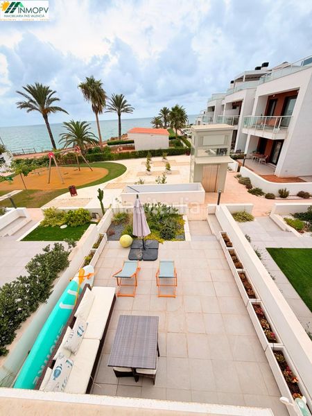 Foto 43ee1f81-f4a5-488d-b4f7-ee087c275b23. Casa adosada vivienda adosada en urbanizacion privada Costa Norte zona barbiguera! primera linea del mar! en Vinaròs