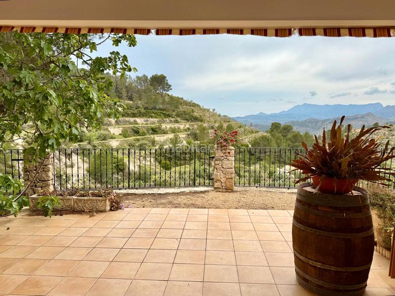 Foto 25a3a497-b426-49d0-93f7-2f5185c8a4dc. Masia amb xemeneia calefacció a Sella