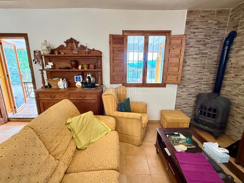 Foto e11a11f9-0fde-4c88-be63-7ec5ff1f9a0e. Masia amb xemeneia calefacció a Sella