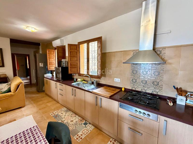 Foto fe0ccbd2-4ef3-4d77-980f-442e902f7d0c. Masia amb xemeneia calefacció a Sella