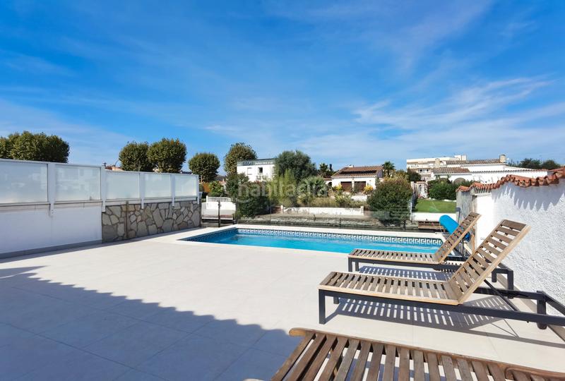 Foto 28907698-6fa7-4822-a88f-e8810b2b1bb8. Maison avec cheminée chauffage parking piscine dans Empuriabrava