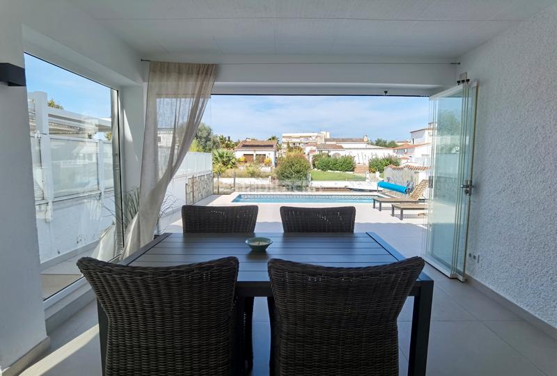 Foto ea89fe14-1312-4229-baac-854198a943df. Maison avec cheminée chauffage parking piscine dans Empuriabrava