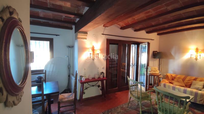 Foto 5cfe52f1-96ca-413b-a7d2-b6a375433a00. Casa adossada amb xemeneia a Golf Costa Brava Santa Cristina d´Aro