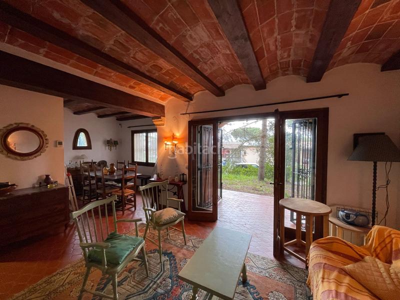 Foto d224e276-af26-4d41-a409-adaeffbdc740. Casa adossada amb xemeneia a Golf Costa Brava Santa Cristina d´Aro