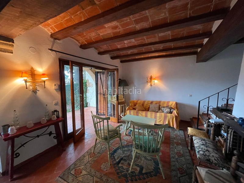 Foto f2534a98-36a7-415f-acc0-b4e05d432ac5. Casa adossada amb xemeneia a Golf Costa Brava Santa Cristina d´Aro