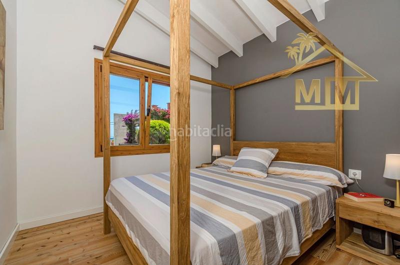 Foto f7f2701c-9cd7-4151-a475-c6aba0e63544. Chalet in carrer llevant de punta prima 24 in Biniancolla-Punta Prima Sant Lluís
