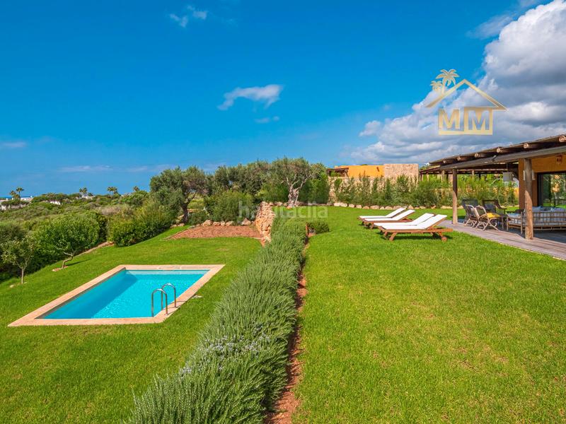Foto 21652906-2091-427c-b4fb-b78ddf0d3c30. Chalet en carrer de llevant 31 chalet en binisafua con vistas al mar vigilancia 24/7 picina jardin en Sant Lluís