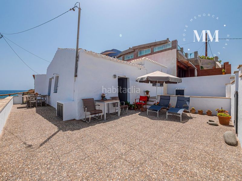 Foto 612fd5c6-a7ee-42c3-9b78-8dff858c8ee8. Casa pareada en exclusiva, vivienda única frente al mar en sa mesquida en Maó / Mahón