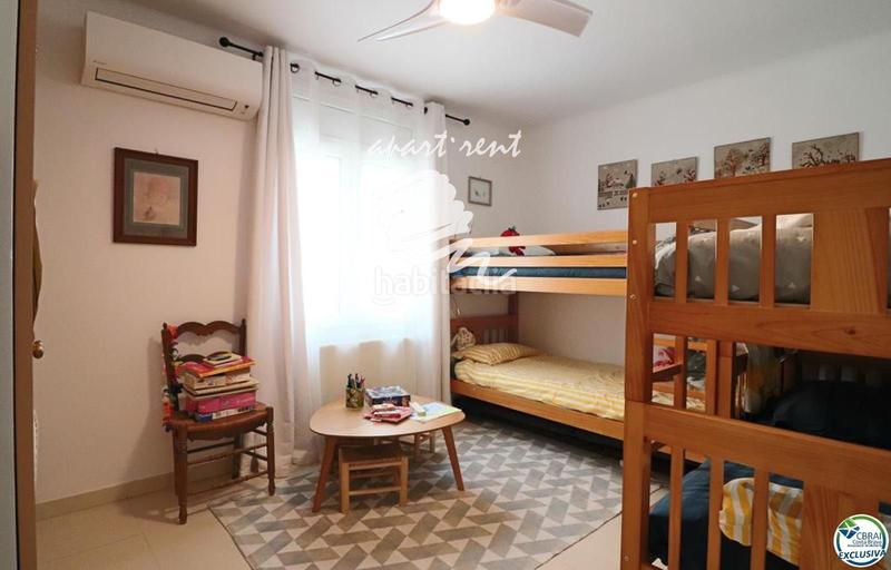 Foto 35b9e2ab-cd09-4e5b-a02a-db7cb6baf5d8. Casa norfeu amplia villa al canal con amarre de 12 m, con apartamento invitados en Empuriabrava