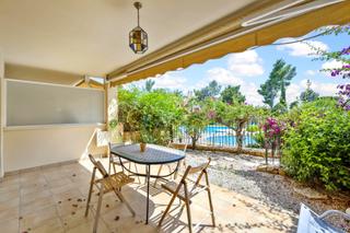 Location Appartement à Mascarat. Bajo con terraza en urbanización tranquila