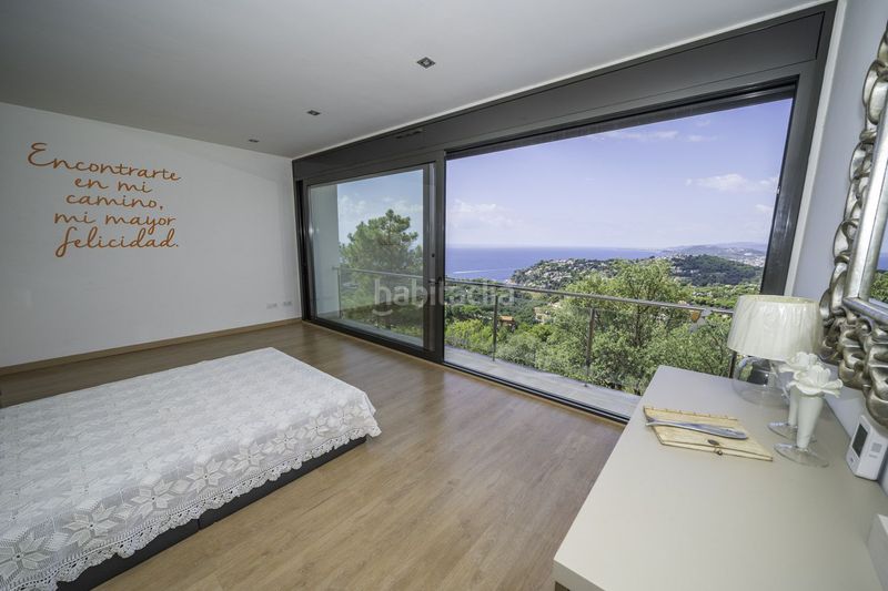 Foto 4aedd175-d7ae-4ae7-a72a-cf1caac0d3a5. Casa amb calefacció aparcament a Canyelles Lloret de Mar