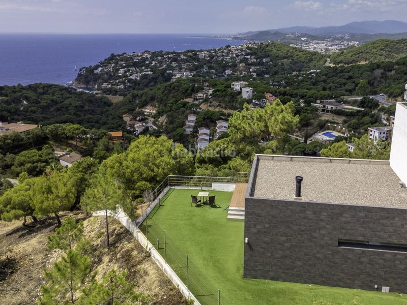 Foto f6b17b5d-dbe9-42ce-bb63-bdb8715e7008. Casa amb calefacció aparcament a Canyelles Lloret de Mar