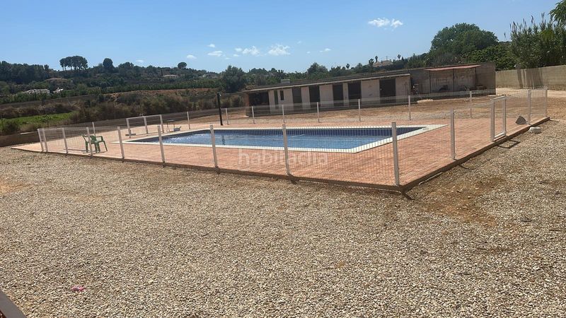 Foto 82ca4178-eb76-4e67-964f-ad76c2b1ff09. Xalet amb xemeneia aparcament piscina a Carlet