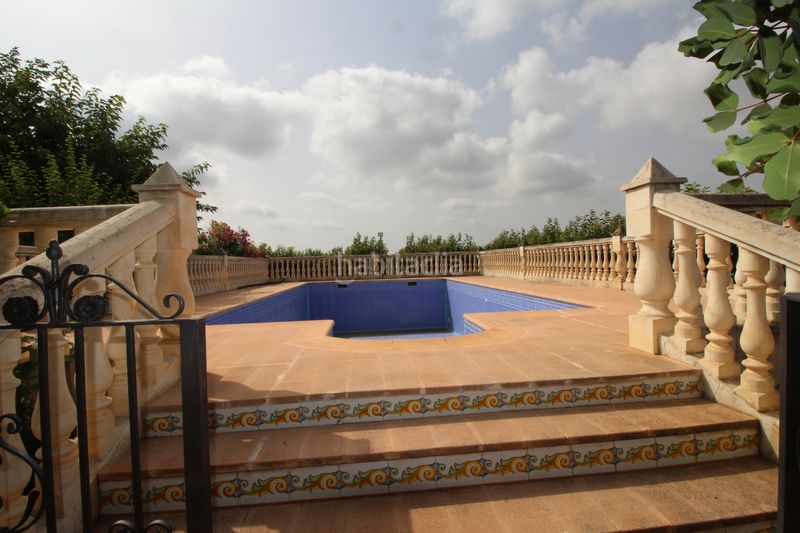 Foto 1dceefa8-35ba-4e23-b7f1-62aee59efed2. Xalet amb xemeneia aparcament piscina a Benimodo