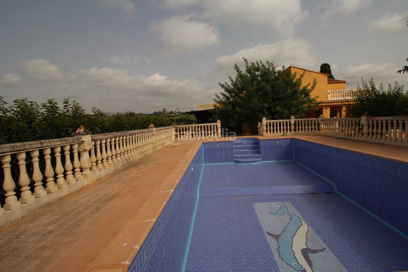 Foto 9d1c0fc6-243b-42d2-8e94-edfcdb50f0e2. Xalet amb xemeneia aparcament piscina a Benimodo