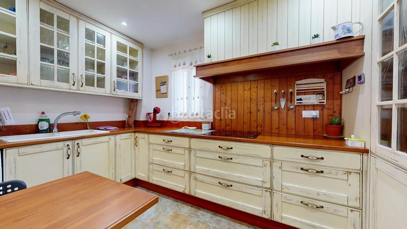 Foto f142ed6a-f291-4a96-88f9-586c7c7ff059. Casa adossada a El Alborgí Paterna