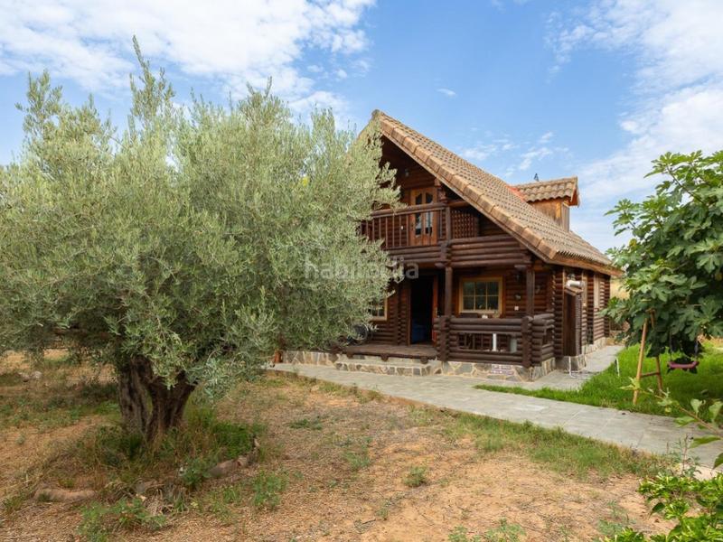 Foto f8a78d49-f809-43af-a1f5-52e1a30e68db. Chalet avec parking dans Cheste