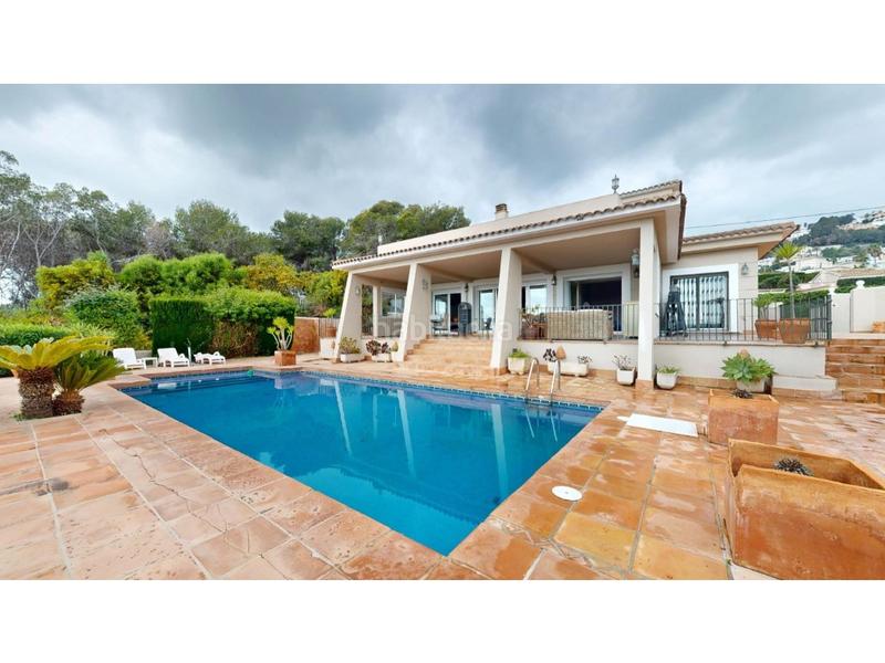 Foto 7614deca-8b27-4532-875f-0f0fdac1a280. Chalet con riscaldamento parcheggio piscina in El Portet-Pla del Mar Moraira