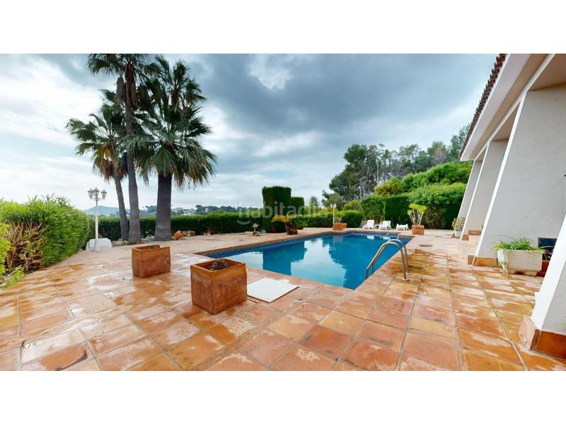 Foto 9730faed-22c2-4fe6-9d1f-fc35e4cbac4b. Chalet con riscaldamento parcheggio piscina in El Portet-Pla del Mar Moraira