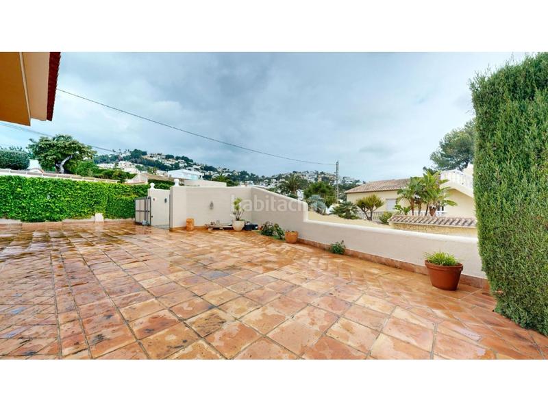 Foto a70a47ae-0fa8-49f2-823a-f26a9a64f575. Chalet con riscaldamento parcheggio piscina in El Portet-Pla del Mar Moraira