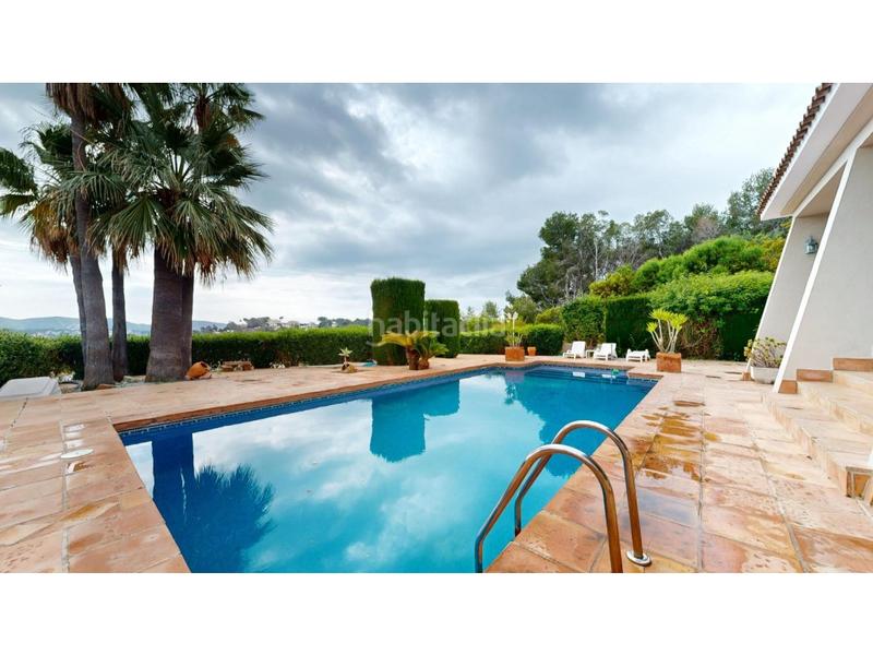 Foto b2c9981c-44eb-408a-9b16-68bcc025ab49. Chalet con riscaldamento parcheggio piscina in El Portet-Pla del Mar Moraira