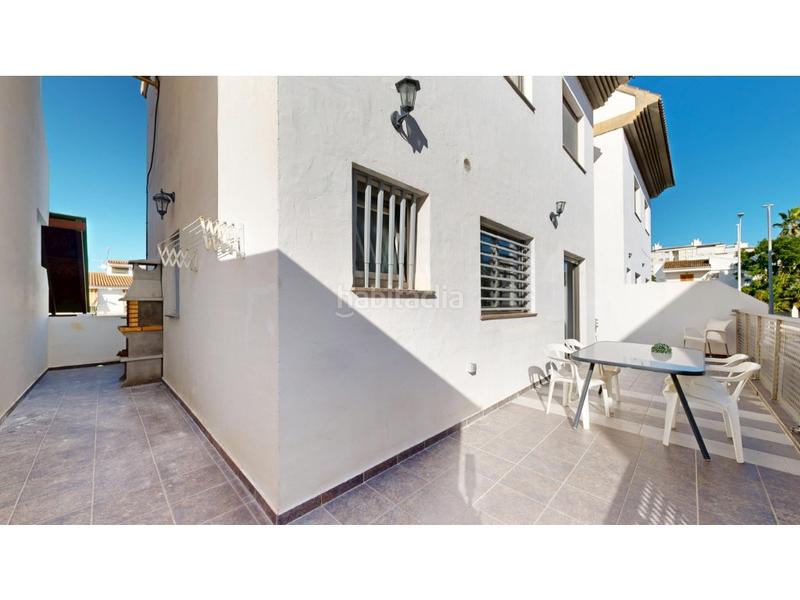 Foto 6371bafa-40bf-4640-8db3-5fc8a91a7107. Casa adosada chalet pareado playa en Playa de Gandía Gandia