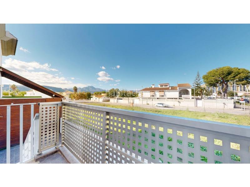 Foto 6f084775-f615-4d6f-8e91-d5e2be7cbf3e. Casa adosada chalet pareado playa en Playa de Gandía Gandia