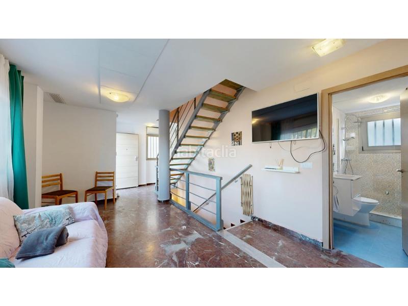 Foto d9f94932-1e75-4f48-9197-a1c12a5ca69f. Casa adosada chalet pareado playa en Playa de Gandía Gandia