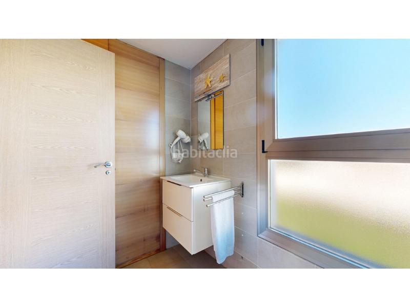 Foto f09ac103-8c47-43c6-8795-85087f4ae536. Casa adosada chalet pareado playa en Playa de Gandía Gandia